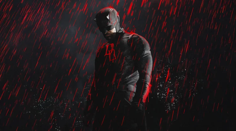 Pôster da segunda temporada da série Demolidor: Renascido, destacando o ator Charlie Cox como o herói Demolidor. Ele está no centro da imagem em uma pose sombria e imponente, com a cabeça levemente abaixada. O personagem veste um traje tático escuro e texturizado, incluindo o clássico capacete com pequenos chifres que cobre a parte superior do seu rosto, deixando apenas o queixo com barba por fazer à mostra. No peito do traje, brilha um emblema com as letras "DD" em neon vermelho. O cenário de fundo é escuro, revelando a silhueta de uma cidade à noite com algumas janelas de prédios acesas. Um efeito visual dramático mostra uma forte chuva caindo, mas as gotas de água são de um tom vermelho vivo e brilhante, criando reflexos avermelhados na silhueta do herói, como se fosse sangue. Capa da crítica da série no blog Multi Nerdz.